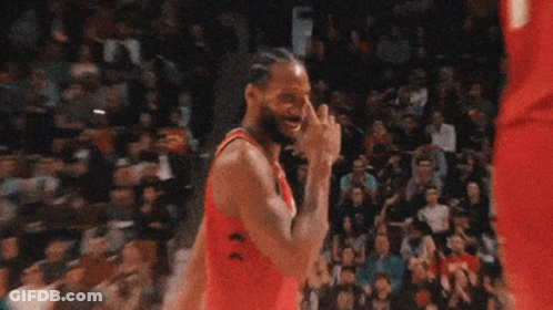 A Basketball Player Wearing A Jersey That Says Rose Talks To Another Player GIF