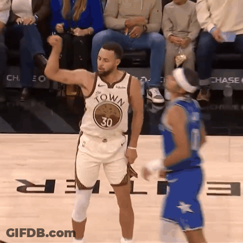 A Basketball Player Wearing A Jersey That Says " Town " On It GIF