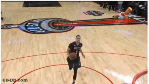 A Basketball Player Wearing A Jersey That Says Wolfpack On It GIF