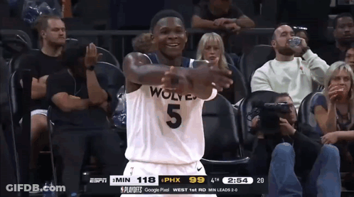 A Basketball Player Wearing A Jersey That Says Wolves 5 GIF