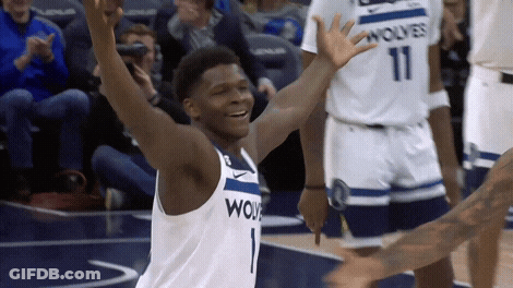 A Basketball Player Wearing A Jersey That Says Wolves GIF