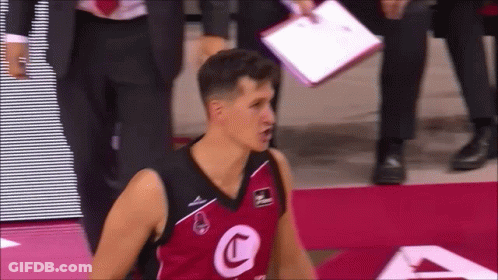A Basketball Player Wearing A Jersey With A Letter C On It GIF