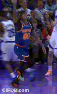 A Basketball Player Wearing A Jersey With The Number 00 GIF