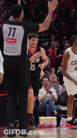 A Basketball Player Wearing A Jersey With The Number 15 On It GIF