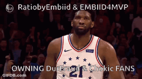 A Basketball Player Wearing A Jersey With The Number 21 On It GIF