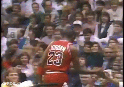 A Basketball Player Wearing A Jersey With The Number 23 On It GIF