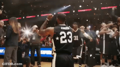 A Basketball Player Wearing A Jersey With The Number 23 On The Back GIF