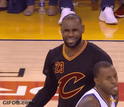 A Basketball Player Wearing A Jersey With The Number 23 GIF