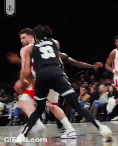 A Basketball Player Wearing A Jersey With The Number 3 On It GIF