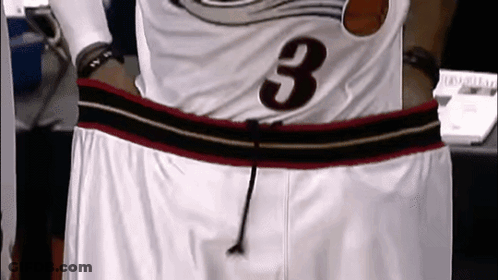 A Basketball Player Wearing A Jersey With The Number 3 On It GIF