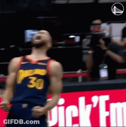 A Basketball Player Wearing A Jersey With The Number 30 On It Is Standing On The Court . GIF