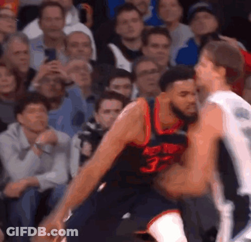 A Basketball Player Wearing A Jersey With The Number 33 GIF