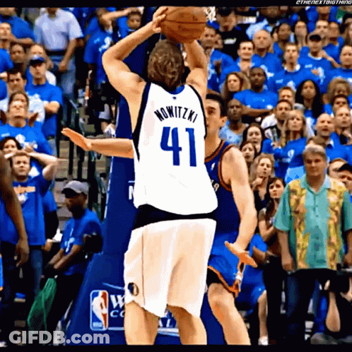 A Basketball Player Wearing A Jersey With The Number 41 GIF