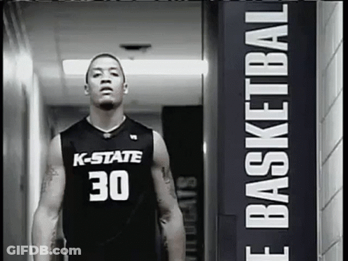 A Basketball Player Wearing A K-State Jersey Number 30 GIF