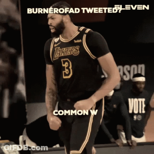 A Basketball Player Wearing A Lakers Jersey Is Celebrating GIF