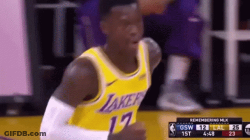 A Basketball Player Wearing A Lakers Jersey Is Giving A Thumbs Up During A Game GIF