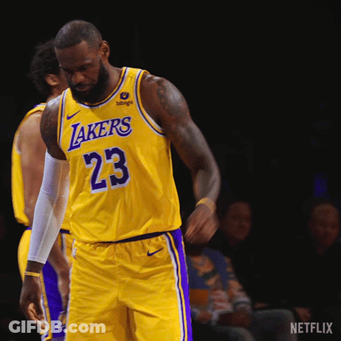A Basketball Player Wearing A Lakers Jersey Number 23 GIF