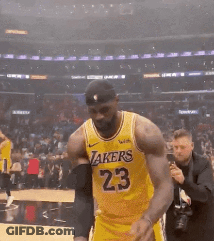 A Basketball Player Wearing A Lakers Jersey Number 23 GIF
