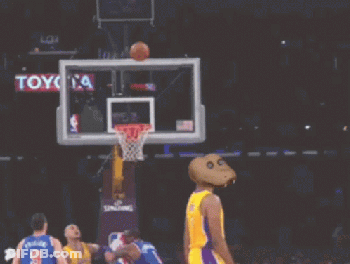 A Basketball Player Wearing A Lakers Jersey Throws A Basketball Through A Hoop GIF