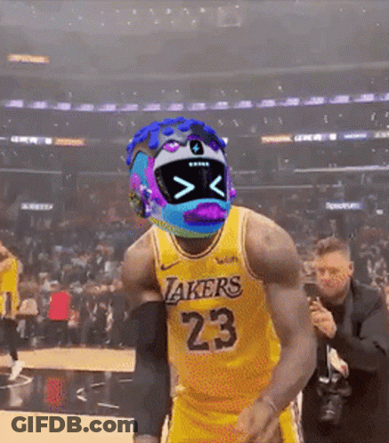 A Basketball Player Wearing A Lakers Jersey With A Futuristic Helmet On His Head GIF