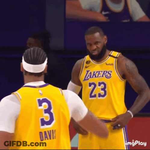 A Basketball Player Wearing A Lakers Jersey With The Number 23 On It GIF