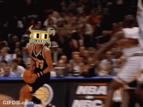 A Basketball Player Wearing A Mask With A Cartoon Face On It GIF