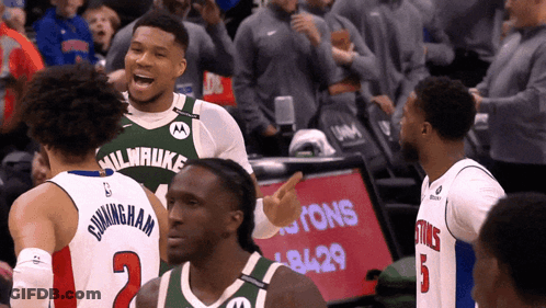 A Basketball Player Wearing A Milwaukee Jersey GIF