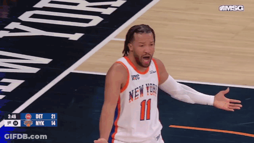 A Basketball Player Wearing A New York Jersey Stands On The Court GIF