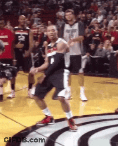 A Basketball Player Wearing A Number 1 Jersey Is Dancing On The Court GIF