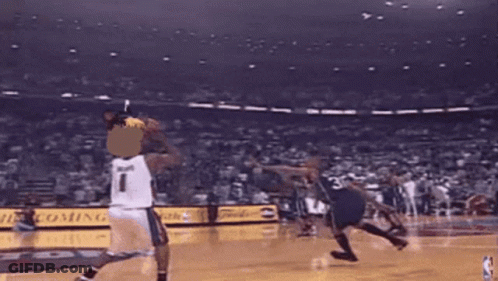 A Basketball Player Wearing A Number 1 Jersey Throws The Ball GIF