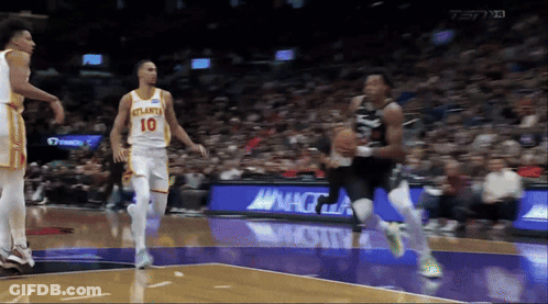 A Basketball Player Wearing A Number 10 Jersey GIF