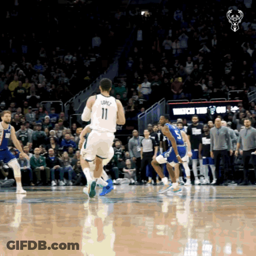 A Basketball Player Wearing A Number 11 Jersey GIF