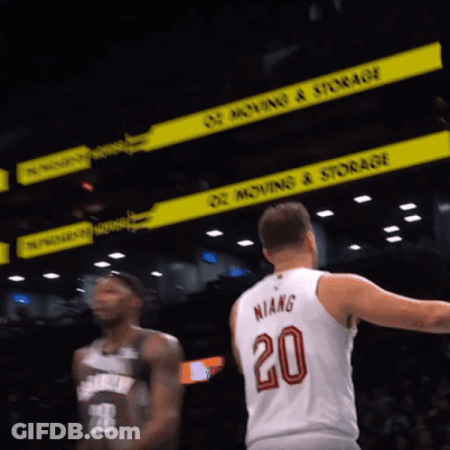 A Basketball Player Wearing A Number 20 Jersey GIF