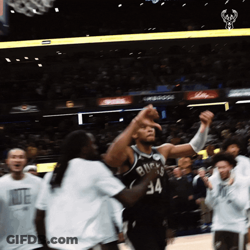 A Basketball Player Wearing A Number 34 Jersey GIF