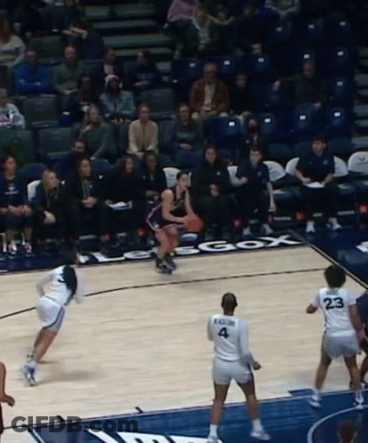 A Basketball Player Wearing A Number 4 Jersey GIF