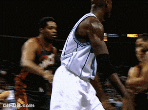 A Basketball Player Wearing A Number 4 Jersey GIF