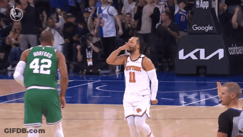 A Basketball Player Wearing A Number 42 Jersey Stands Next To A Basketball Player Wearing A Number 11 Jersey GIF