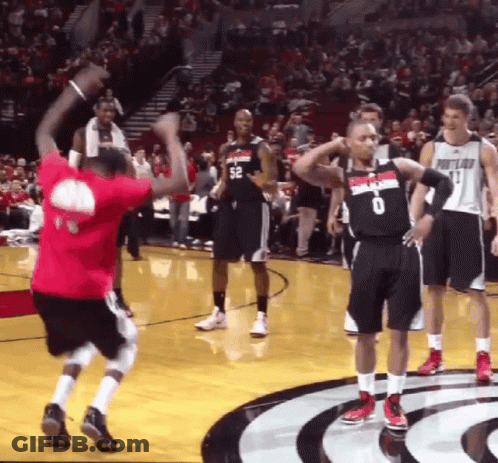 A Basketball Player Wearing A Portland Jersey Stands On The Court GIF