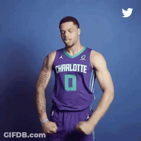 A Basketball Player Wearing A Purple Jersey With Charlotte On It GIF