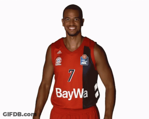 A Basketball Player Wearing A Red And Black Jersey With The Number 7 On It GIF
