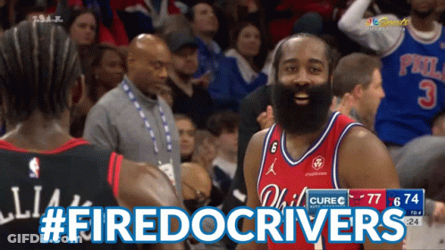 A Basketball Player Wearing A Red Jersey That Says #Firedocrivers GIF