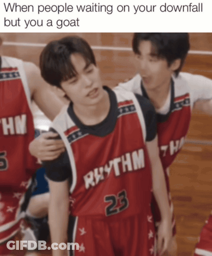 A Basketball Player Wearing A Red Jersey That Says Rhythm 23 GIF