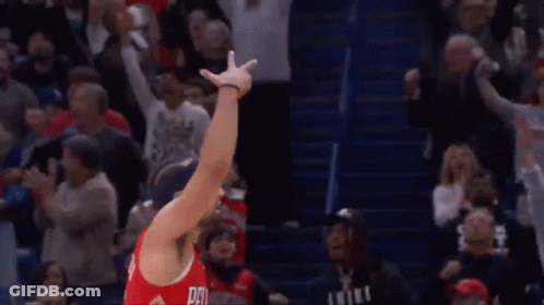 A Basketball Player Wearing A Red Jersey With The Number 15 On It GIF