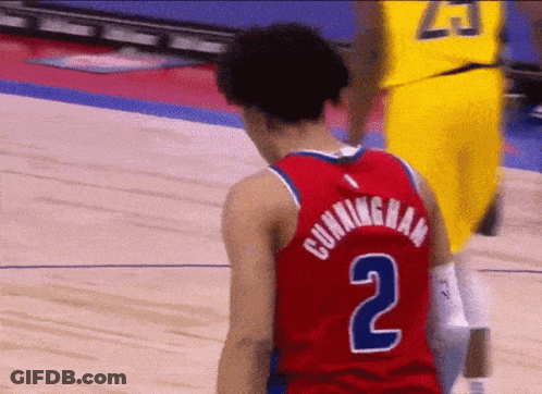 A Basketball Player Wearing A Red Jersey With The Number 2 On The Back GIF