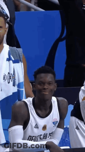 A Basketball Player Wearing A Shirt That Says " Deutsch " GIF