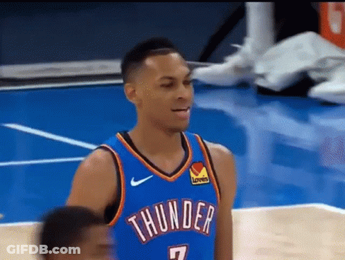 A Basketball Player Wearing A Thunder Jersey Stands On The Court GIF