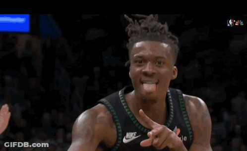 A Basketball Player Wearing A Timberwolves Jersey Is Clapping GIF