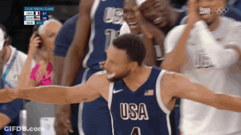 A Basketball Player Wearing A Usa Jersey Celebrates GIF