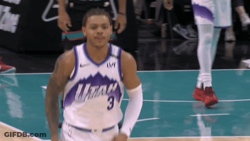 A Basketball Player Wearing A Utah Jersey With The Number 3 On It GIF