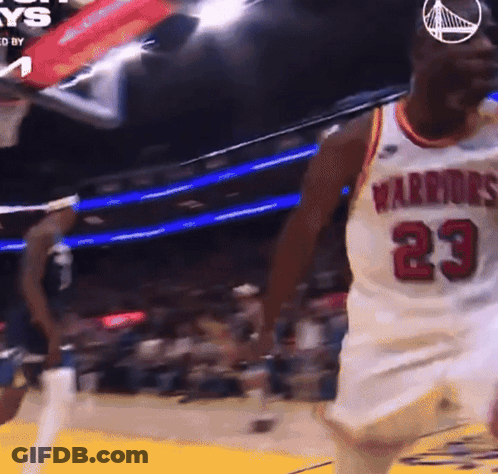 A Basketball Player Wearing A White Jersey With The Number 23 GIF